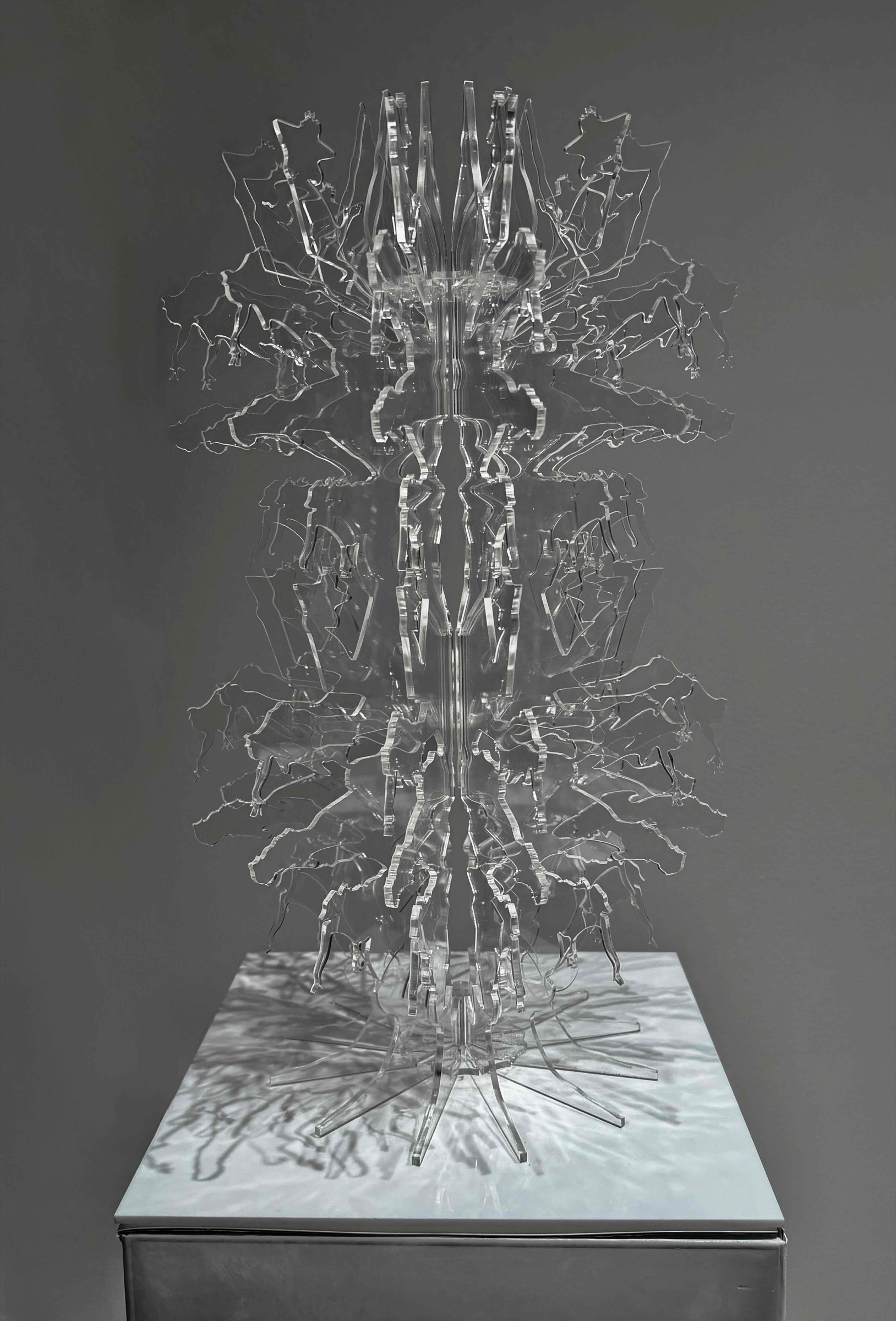 Profile view through the layered acrylic sculpture
